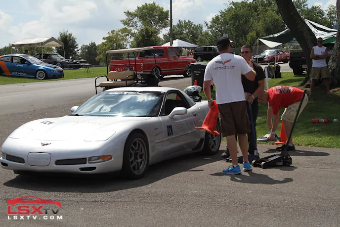 Anybody can knock a cone over - it takes real commitment to wedge one so far underneath the car that it melts on the collector and you need a jack to remove it!