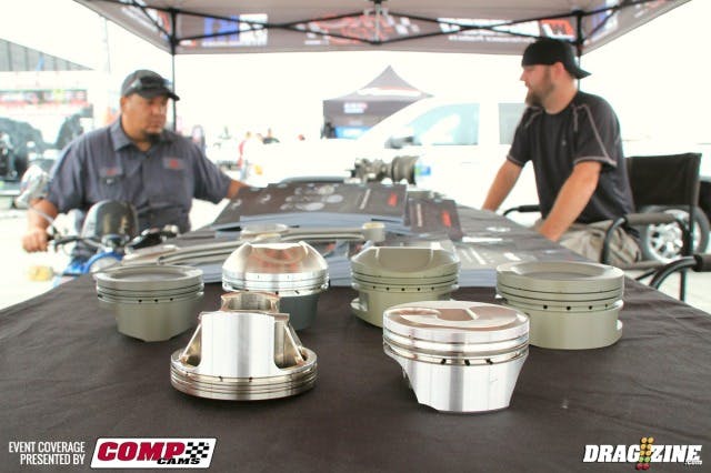 Wiseco has a display for the first time this year showcasing several different piston designs and coatings and their K-1 crank and connecting rods. I spoke with representative Victor Ellinger who ran off a list of racers that use their product, including Dewayne Mills, Steve Jackson, Brad Edwards and Team M&M. You can see the  difference in the greenish hard anodized coating and the gold armor plating. They also offer a billet series piston for custom applications. Oscar Rodriguez from Precision Racing Development (PRD) and Jeff Cartain talk piston tech.