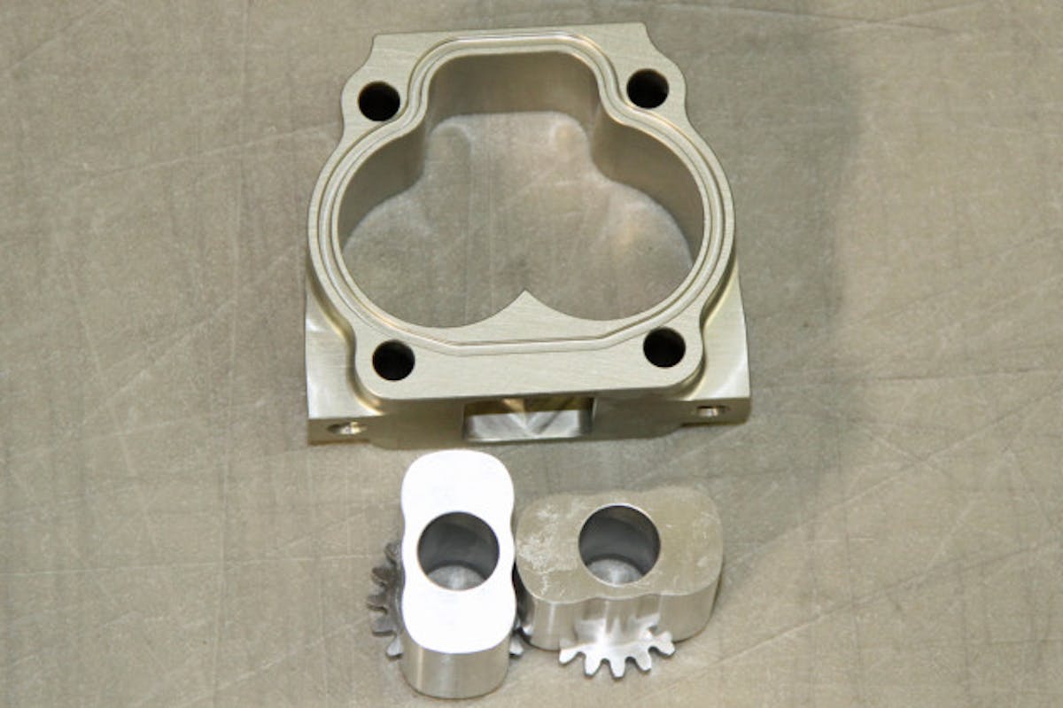 An exploded pump section. Note the drive gears on the back side of the rotors. As the gears are placed on the shaft, the concentricity of these pieces taken as a whole is part of what contributes to the pump's performance.