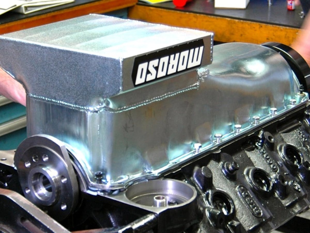 Pans can be secured with studs and nuts or bolts. Each has their pros and cons, with studs being more accessible and bolts being less expensive.