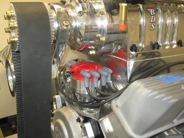 There was an inordinate amount of custom work that went into this build. Rabotnick tells us that his lead machinist, Willie Blair, can do amazing thing with metal. The distributor is a heavily modified unit that uses a big-block Chevrolet 'crab-cap' to allow at-track service of the distributor in the event of an internal issue, and this is the only FE engine in existence with this distributor. Also note the position of the blower drive pulley. The blower snout has been shortened up by a whopping four inches to pull the entire assembly closer to the engine and remove unwanted stress from the crankshaft. 