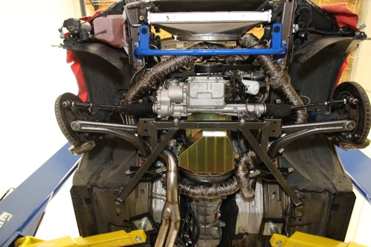 You can see how nicely the JPC Racing turbo system fits here. We also wrapped the hot-side pipes in Heatshield Products' Lava Wrap to keep underhood temps down. The company also recommended their Lava Turbo Sheld, which will help to speed up exhaust gas flow while reducing underhood heat.