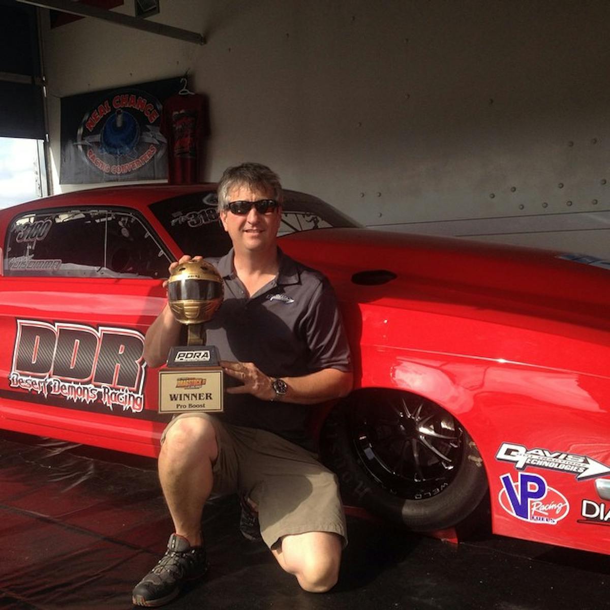 Shannon Davis of Davis Technologies posing with the hardware.