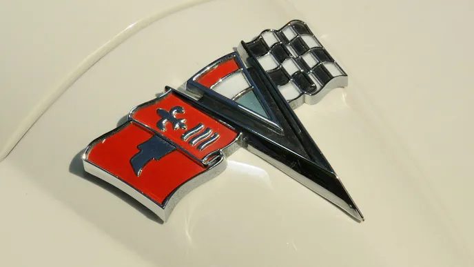 The iconic crossed flag Corvette badge sits prominently on the nose of Bauer's Grand Sport.