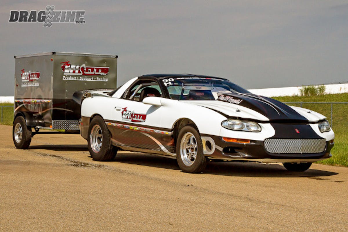 Countless hours were invested in the the cooling aspect of Macy's Camaro, with a custom shroud setup built to the nose to funnel the air into the twin-fan Don Davis radiator. As well, Macy found that utilizing a set of spacers and propping the hood open two inches while driving down the road made all the difference in the world in operating temperatures.