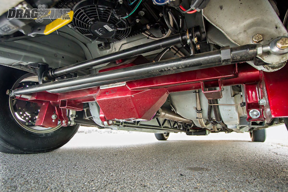 Underneath the car you'll find a Moser M9 rear end housing with Moser axles, riding on Varishock double-adjustable shocks. A set of Mickey Thompson 275 Drag Radial wrapped around 15x10 Weld Racing wheels put it all to the ground.