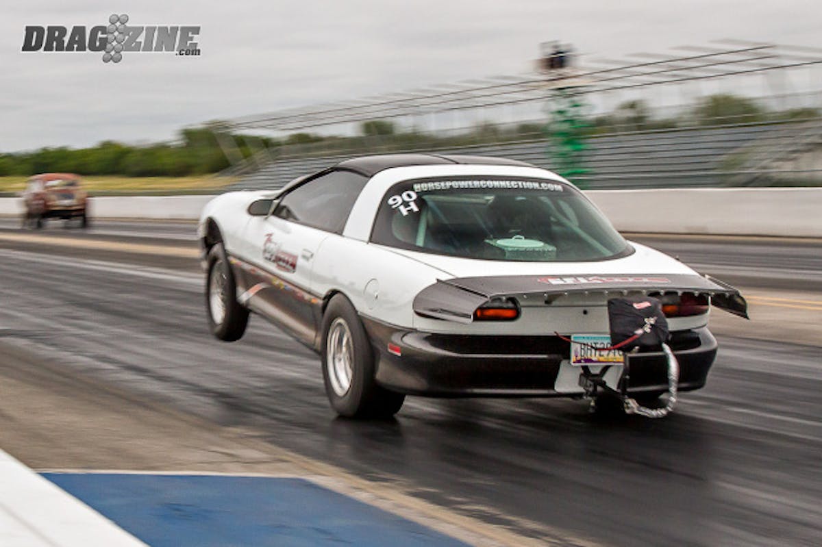 With sights set on Hot Rod's Drag Week, Macy, with the help of co-driver Darin Meroniuk, Horsepower Connection tech Anthony Nelson, and Gabe Salaza, took the Camaro from a rolling chassis to a road-ready machine in just three months time -- with much of the work completed in the final three to four weeks.