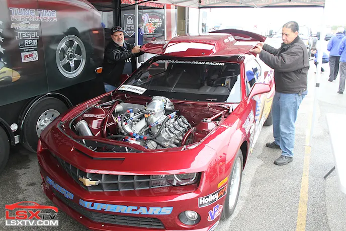 Nick Filipides and Bill Trovato drop the hood on the ARH Camaro, current holder of the "quickest IRS 5th Gen" title.