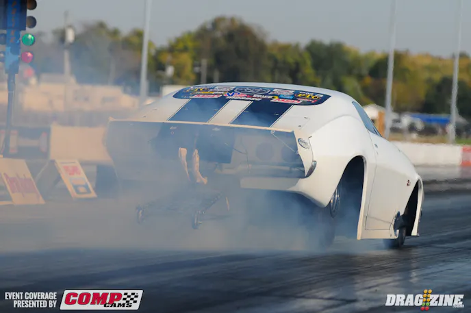 All Steve Summers had to do was take the green in the second round of Pro Mod to clinch the championship, and he did just that on his competition bye run. And in a display of sportsmanship, good friend Dan Green, whose son Josh lost the championship to Summers last night, was out on the starting line to assist the team and offer a round of applause.