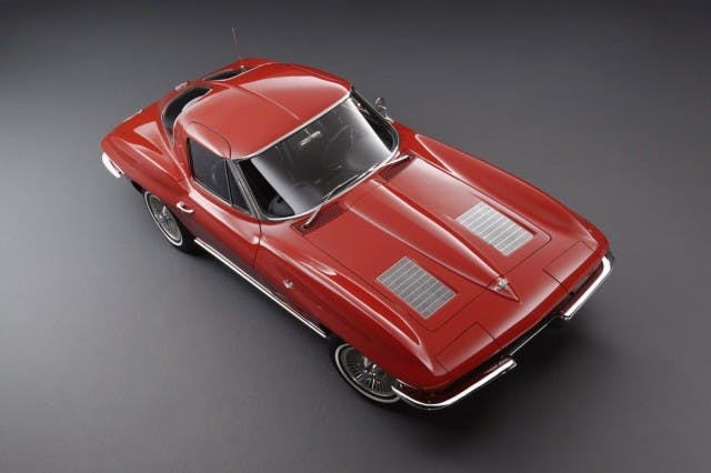 A fire engine red 1963 Chevrolet Corvette Sting Ray (C2) showing the distinctive non-functioning hood vents. (Business Insider)