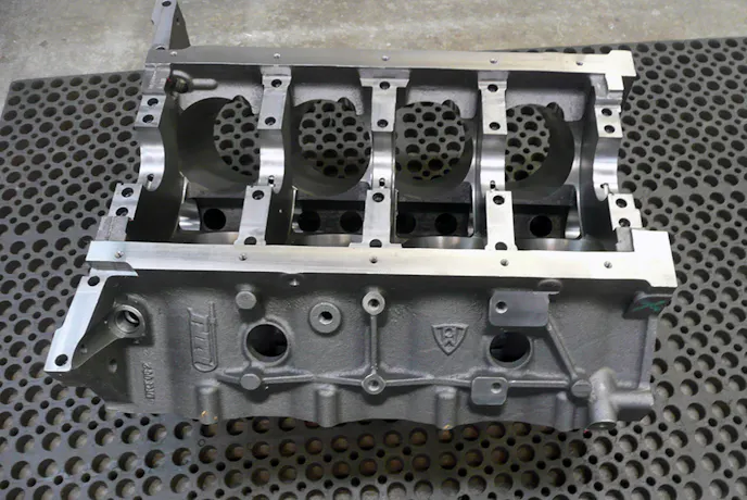 Our block, bottom side up. Here you can see the removed skirt and widened pan rails. Dart designed the block with Iron Eagle pan rail dimensions for further windage reduction.