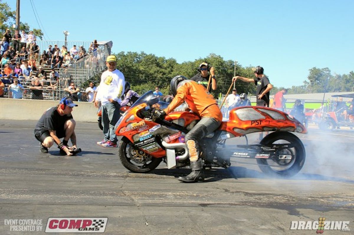 In Pro Street Bike Doug Gall (near lane) was matched with Walter Sprout as the first pair out this morning. Neith was able to improve their time but Justin Doucet jumped ahead or Sprout with a 6.90 at 204 MPH for top qualifier.