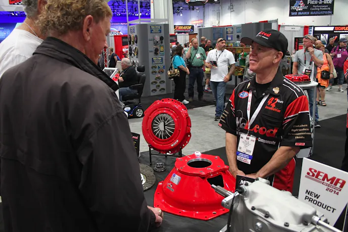 Paul Lee talks bellhousings with show attendees.