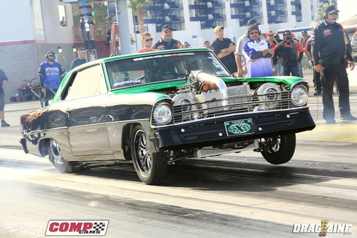 This green and black Chevy II belongs to Matthew Frost from Platteville, Colorado and competed in Drag Week this year. The engine is a AMS Automotive 632 big Chevy fed by twin 88mm Pro Mod turbos from Precision. He is anotehr racer setting personal best ET's this weekend with a best of 7.48 at 188 MPH. The car was just finished for Dragweek making this their first official race for the new build.  Matt's own companies sponsor the car, In and Out Oilfield Services and In and Out Custom and Collision.