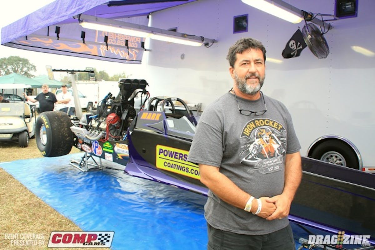 We spoke with Artie McElwee this morning, car owner of the Powershield Coating dragster driven by his brother Mark. They hurt a cylinder at the last race int he final after hurting an engine testing back in October so the crew took a look and re evaluated their engine program on the break. They have redone the fuel system to supply more fuel at DMPE with Darren Mayer.