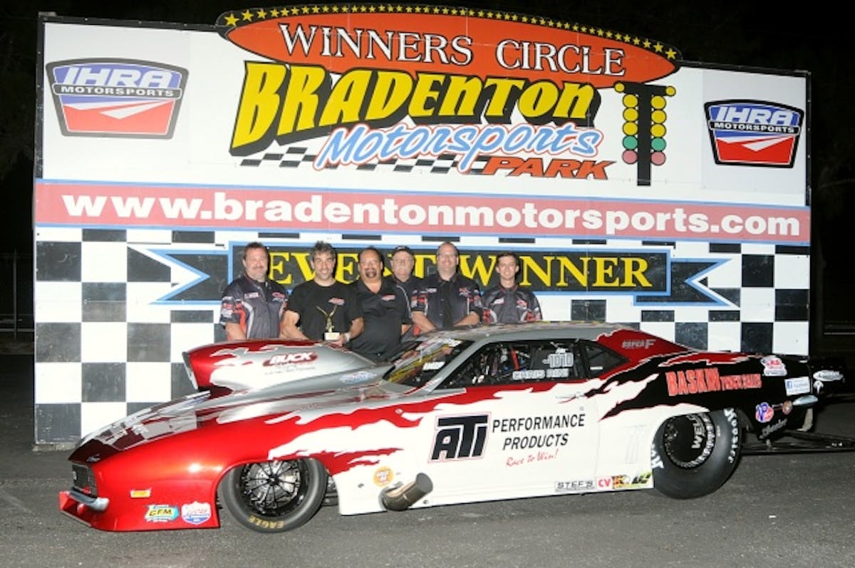 Outlaw Pro Mod runner up Chris Rini had a good weekend qualifying number two and running several 3.81's before hurting the engine in the final and slowing to a 3.868 at 189 after the DA dropped to 530 feet. Sponsors on the car include ATI, Buck Racing Engines, Switzer Dynamics, Lithium Pro Batteries,  Steffs, Lovendhall Racing and Baskin Truck Sales. Most of the sponsors are locked in for 2015 with Rini planning to run the full Big Dog Shootout series. Crew for the team is David Campbell, Clint Lovendhall, Tim Davis and Ken Moser. Photo courtesy Bryan Epps.