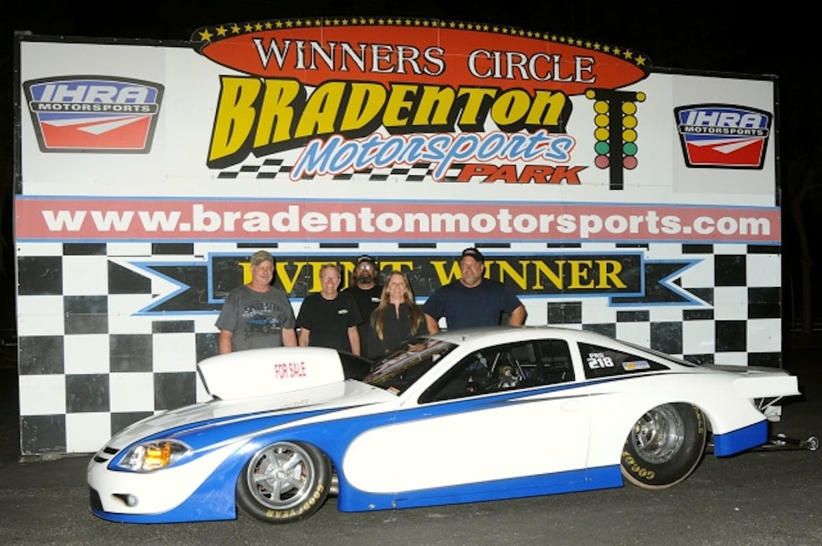 Tom Lee showed up with his former Pro Stock car and a new engine just installed Wednesday and struggled with tire shake in testing and qualifying. The team traced the issue to a broken rear shock, likely damaged from the tire shake and swapped them out for Sunday's eliminations and promptly putting up a 4.40 at 158 MPH in round one this morning. Richard Earle from Suncoast Race Cars was here assisting with several cars this weekend and gave a hand to Lee along with the Voss Racing crew. He put up a stellar 4.32 in round two and finished the night with a 4.366 at 159.80 in the final against Stephen Adams taking the win. Photo courtesy Bryan Epps.