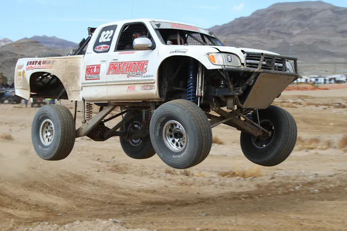 This Toyota Tundra was retrofitted with an I-beam setup usually found on Fords. Notice the negative camber at full droop.