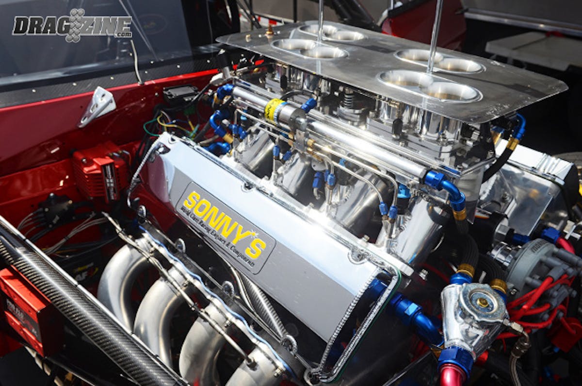 Here's the money-maker: a 903 cubic inch GM wedge-style bullet from Sonny Leonard, with four stages of nitrous oxide that delivers an estimated 2,750 horsepower. And with plenty of polishing work throughout, it'll blind you on a bright, sunny day.