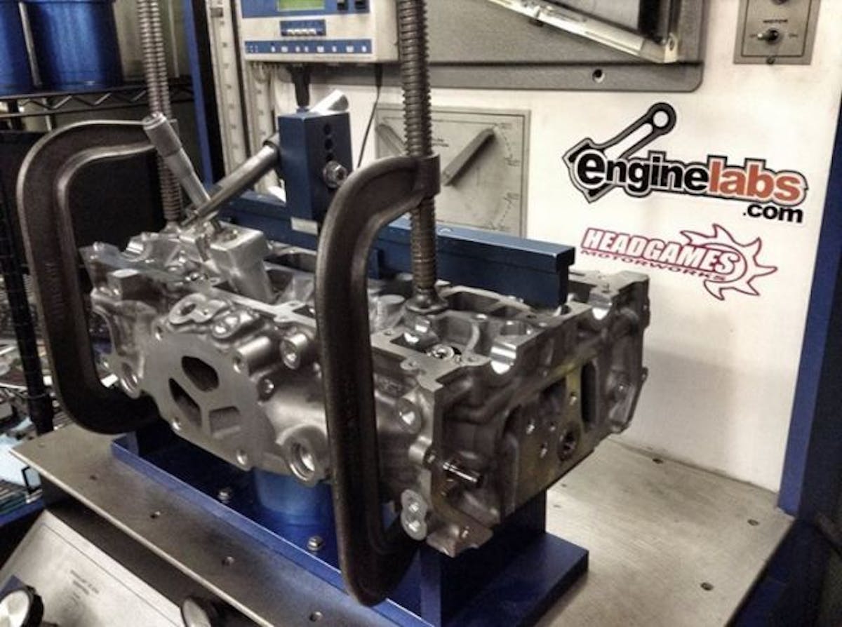 The cylinder head on the flowbench at Headgames Motorworks.