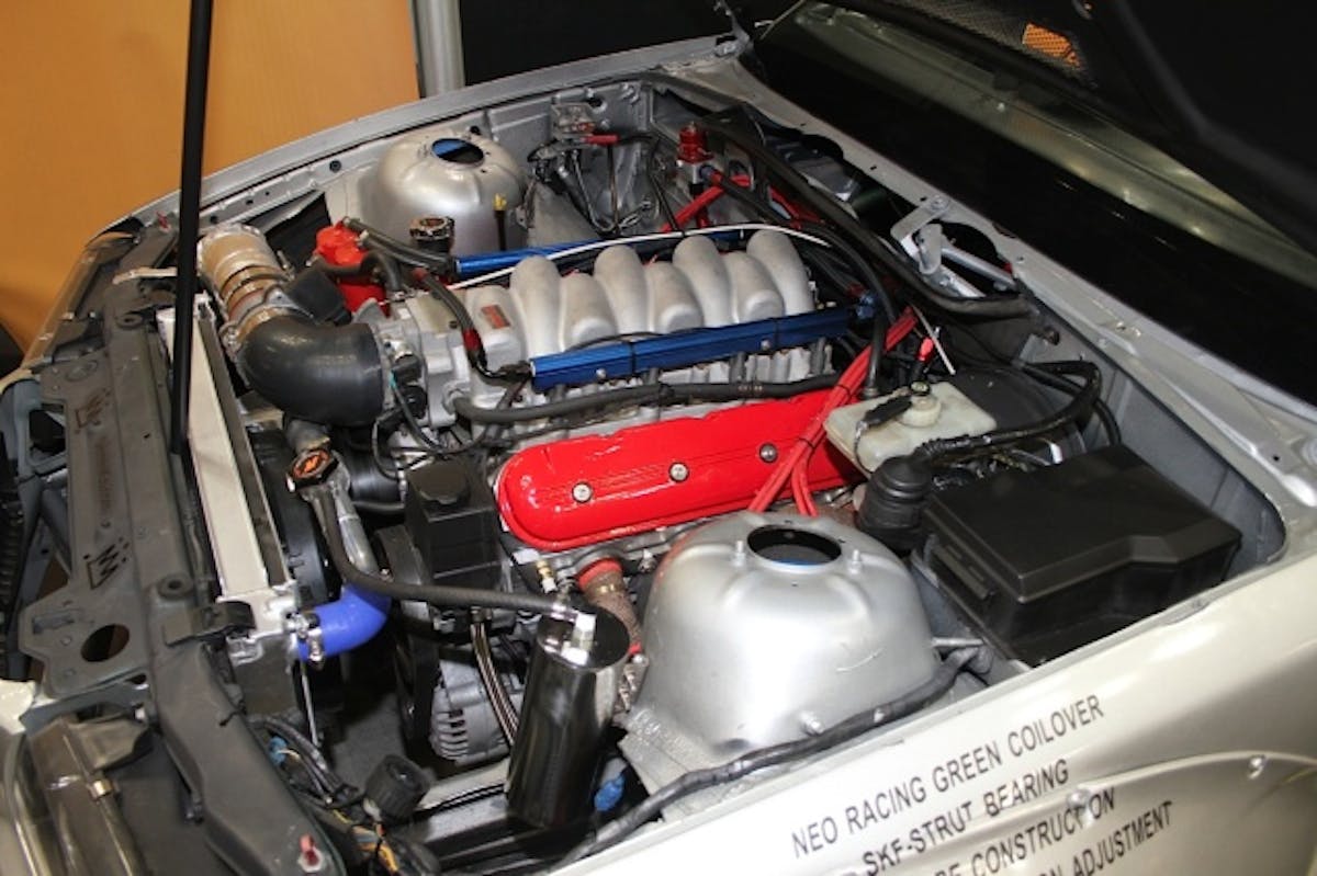 This E36 with a Rocket Bunny widebody kit was on display in the Neo Motorsport booth to show off the company's brake and coilover kits, but we were more interested in what was under the hood.