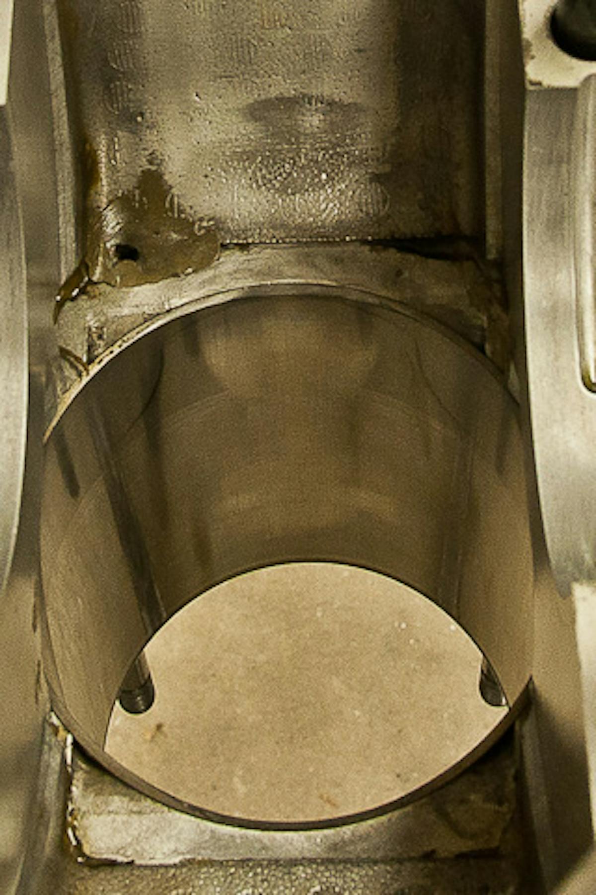 The cylinder insert seen from inside the crankcase.