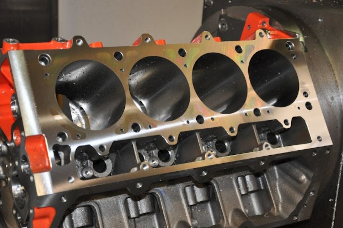 A look at the final-machined deck surface, Note the coolant holes that have been drilled into each deck plug.