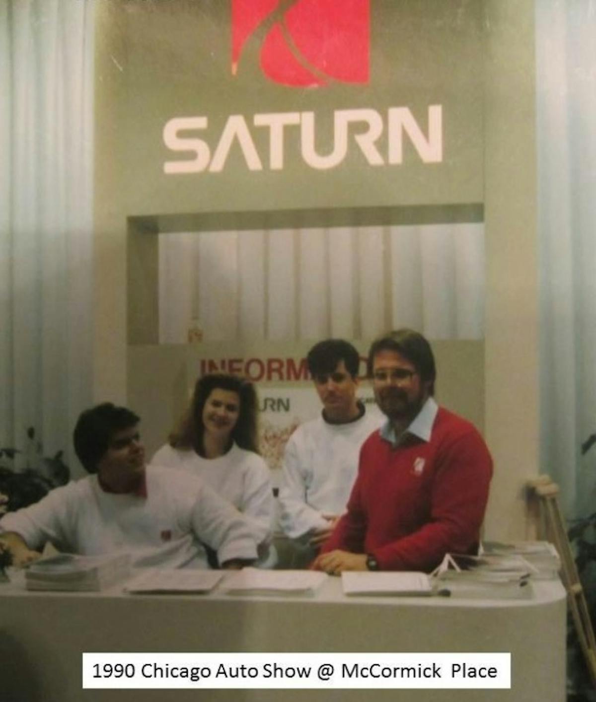 Wearing the red sweater Montileone was a spokesman for Saturn Corporation at the Chicago Auto Show in 1990.