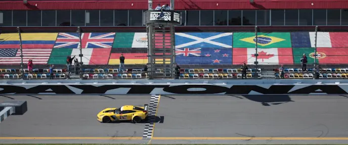 Corvette C7.R Crossing the line to take the chequered flag and the GTLM Class victory.