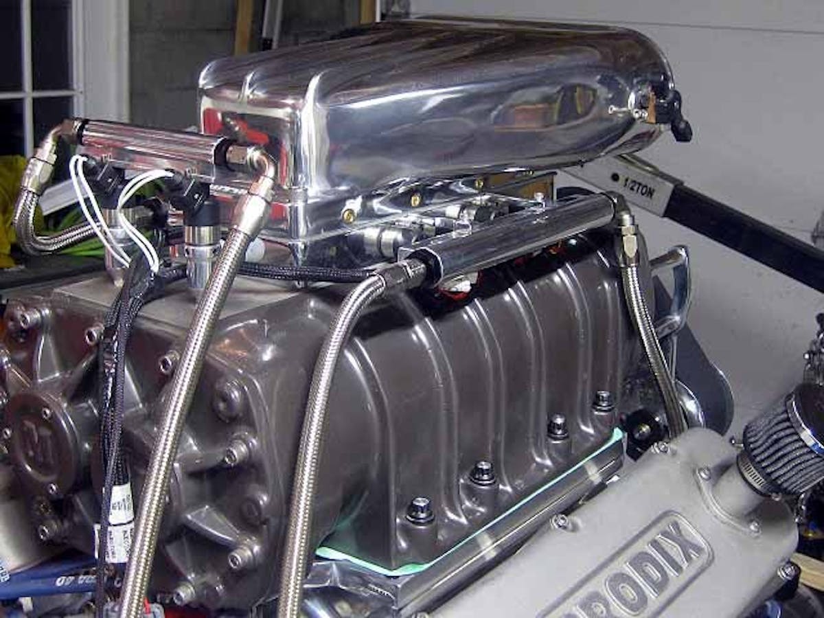 Four injectors in each side, and two in the rear provide enough fuel to keep the engine happy and air inlet temperatures down.