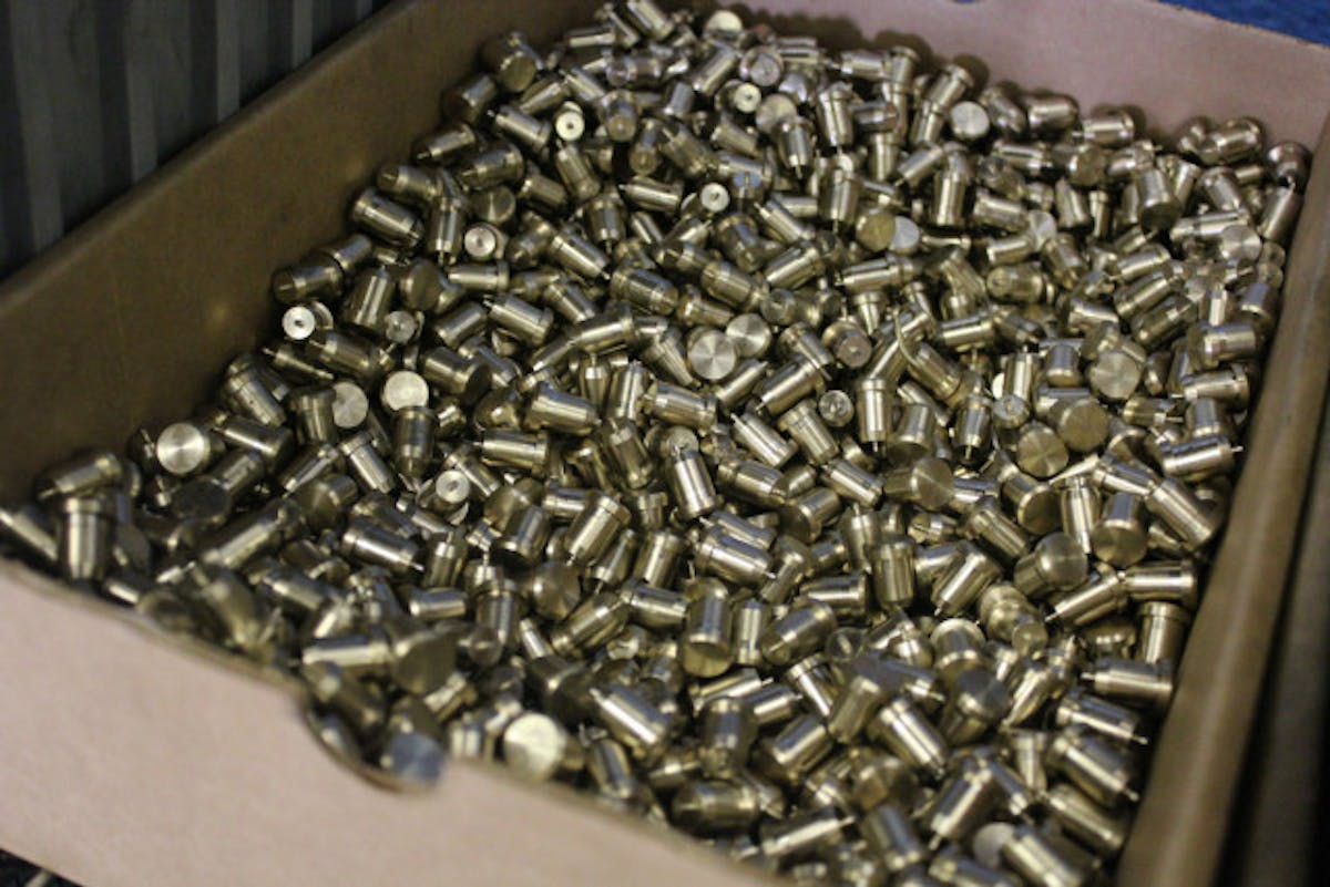 Fuel pump pushrod tips in line to be ground to the proper dimensions.