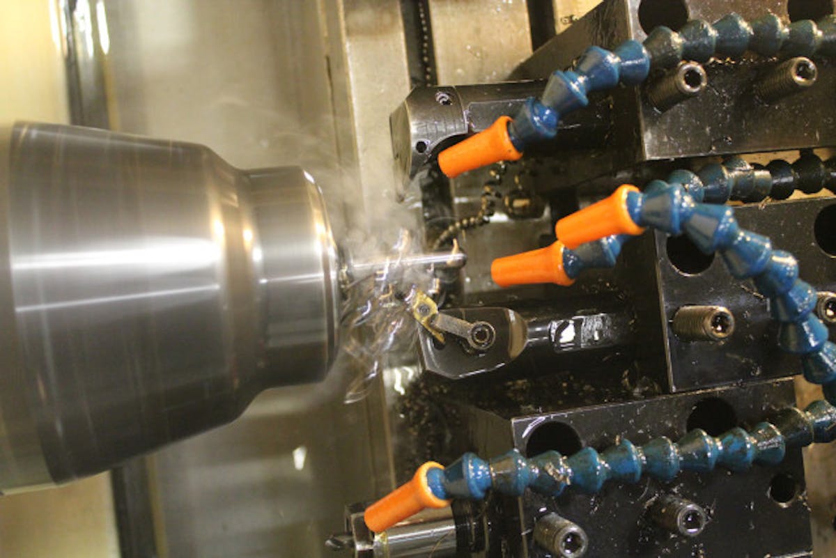 A pushrod during the machining process.