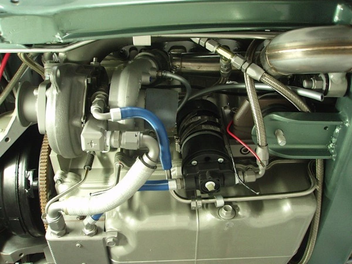 Fitting stainless steel braided oil lines to the turbochargers was so arduous that Raczuk had to invent his own tool to install them.