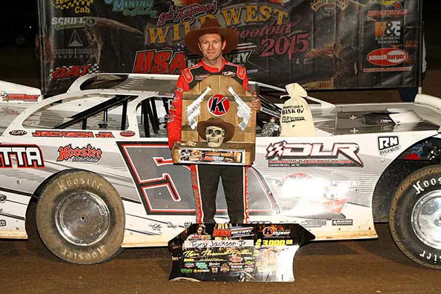 A pushrod in the fixture to check for runout.