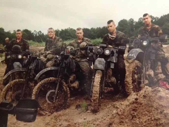 Rangers from 1st Battalion, 75th Ranger Regiment, train on their Honda bikes in 1995 at Hunter Army Airfield, Ga. (Pictured from left to right: Ranger Corey Collins, Ranger James Moore, Ranger Trevor Debeor, Ranger Kenneth Johnston, and Ranger James Noel.) Photo by Ranger Kenneth Johnston.