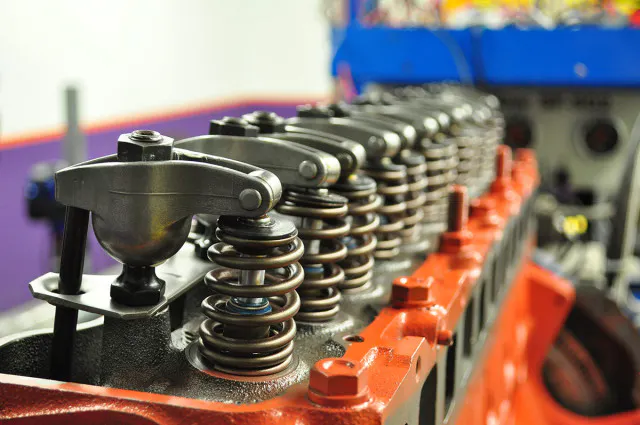 Twelve little soldiers, all in a row. Lined up and awaiting time on the dyno are COMP Cams roller-tip rockers and a full complement of Crow Cams valvetrain gear.