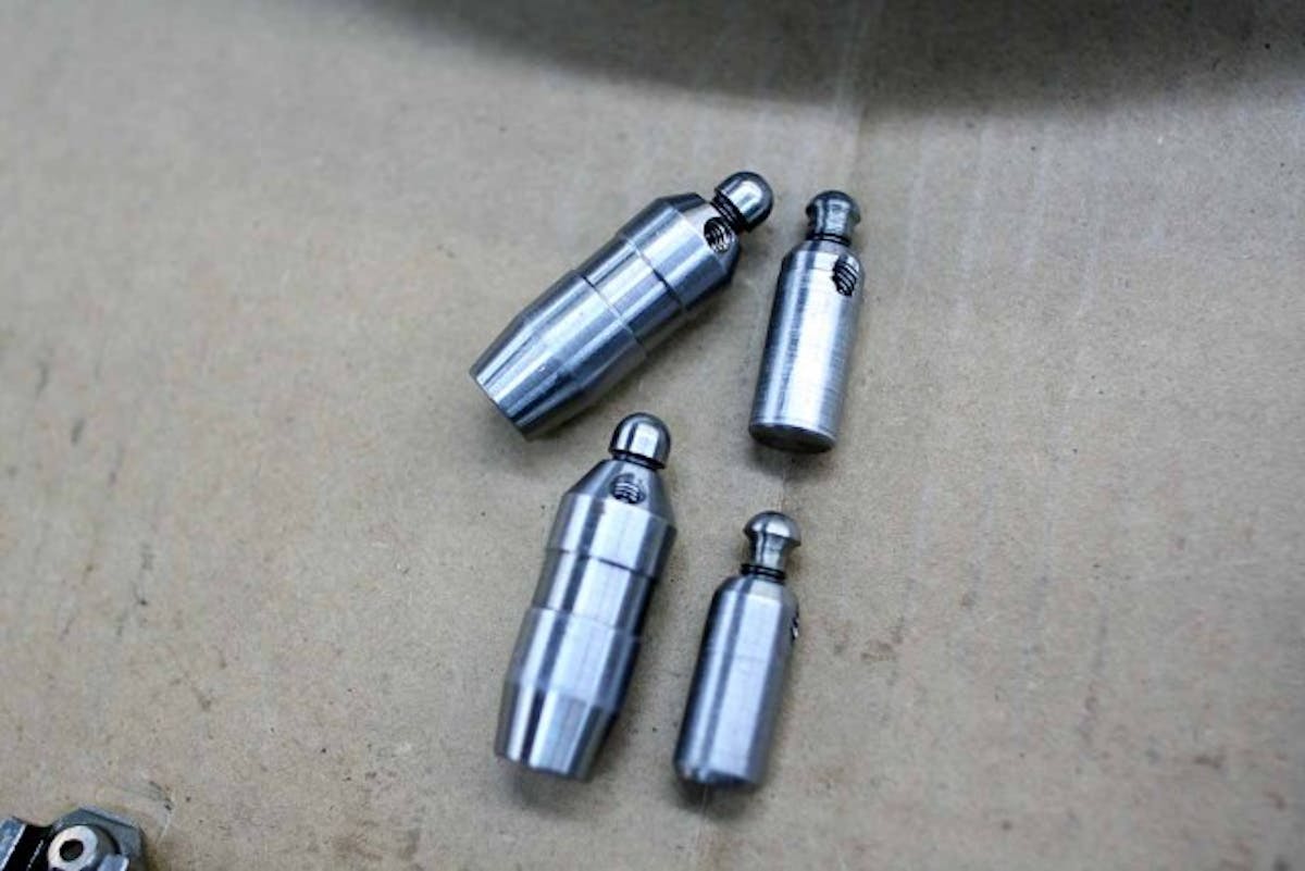Custom threaded solid lash adjusters made by L&M permit the builder to set the follower to zero lash to perform the rest of the timing measurements.