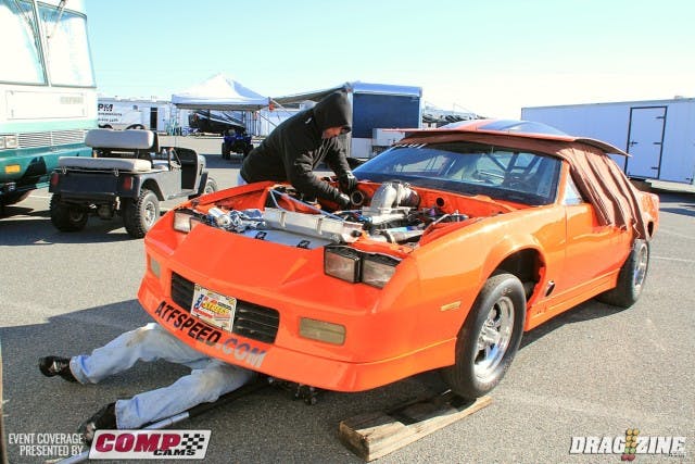 Mike Fratena had to work on the car this morning after pulling several rocker stand bolts out. They were just getting things back together when we dropped by their pits. Fratena has run well so far this year in Ultra Street trim running several passes in the 5.0 range with his single turbo small block Chevy.