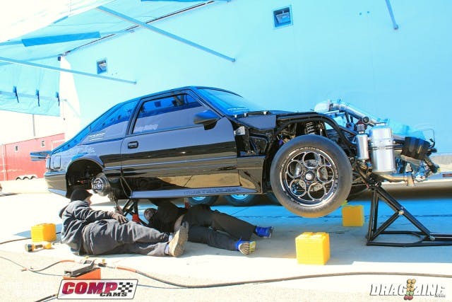 Jacky McCarty is here with a brand new car out of his own McCarty Performance shop. He runs a single Precision turbo combo in X275 with a Cox Racing Engines small block.  They were making some adjustments to the rear suspension this afternoon.