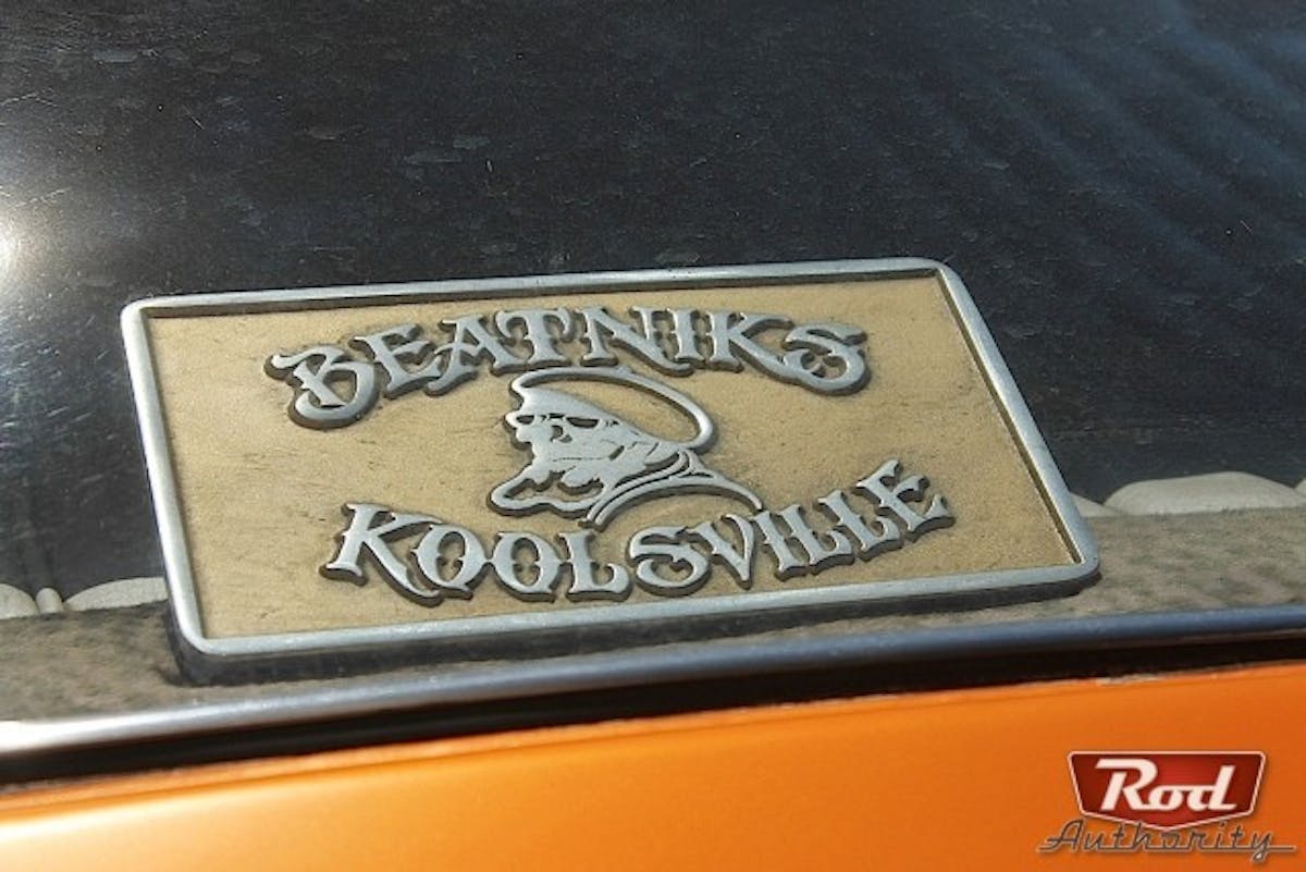 A badge bearing the name of Gambino's club, the Beatniks.