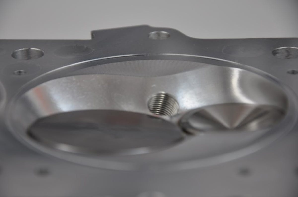 Another angle of a softened combustion chamber. This modification is best left up to your cylinder head provider to determine what type of angle will be best for your combination.