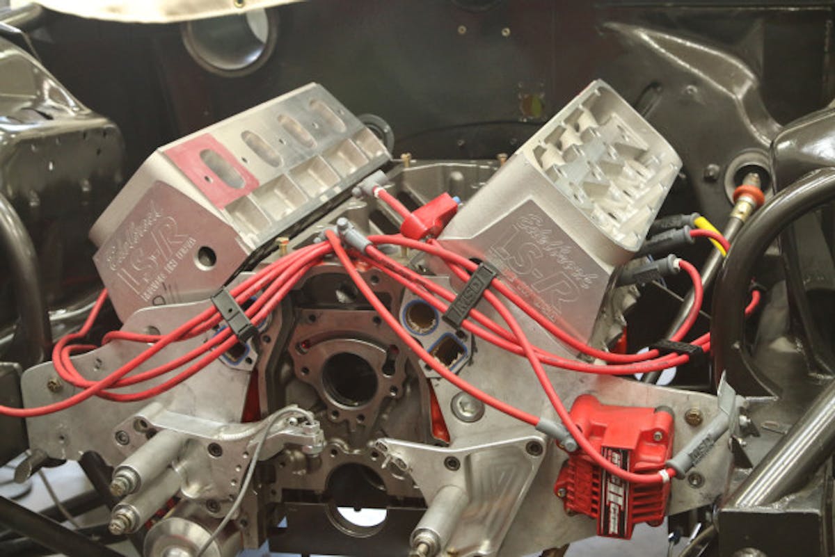 The Edelbrock LS-R-equipped LS engine used to fabricate the headers for this article. The collector exit location will be between the tire and leading edge of the door on each side.