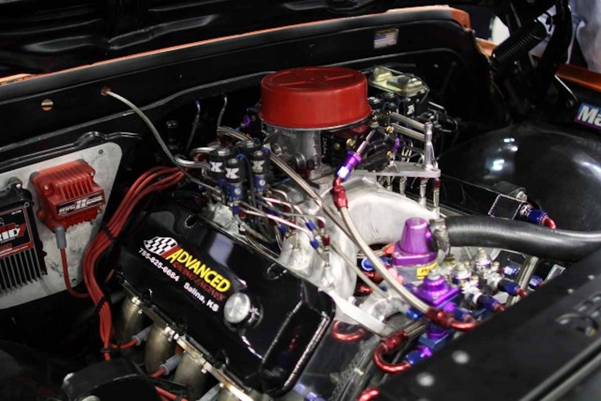 Some engines - like this one, found under the hood of the Street Outlaws 'Farm Truck' employ multiple stages of nitrous. We have no idea how many actually get turned on during a race, though..