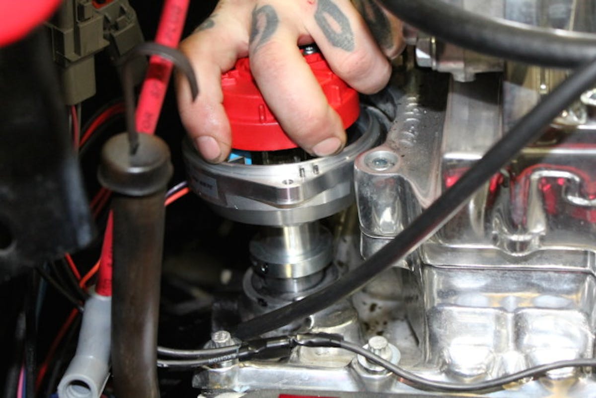 Before tighten down the shock collar we just turn the rotor to match up with our mark on the intake.