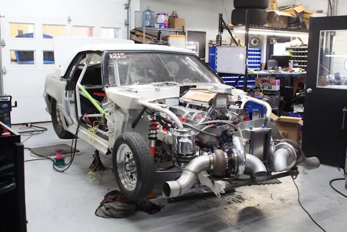 The car is currently in primer, but will be going to Vincent's Auto Body for fresh white paint.