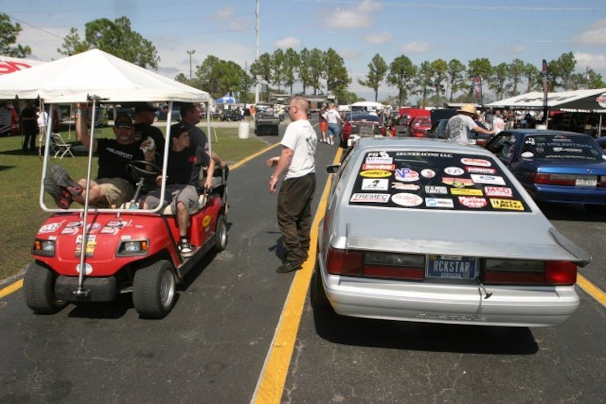 John Leslie Jr was chatting with Joe Charles and crew in the lanes before a test and tune pass. Leslie is loving his Factory Stock ride's new Coyote powerplant.
