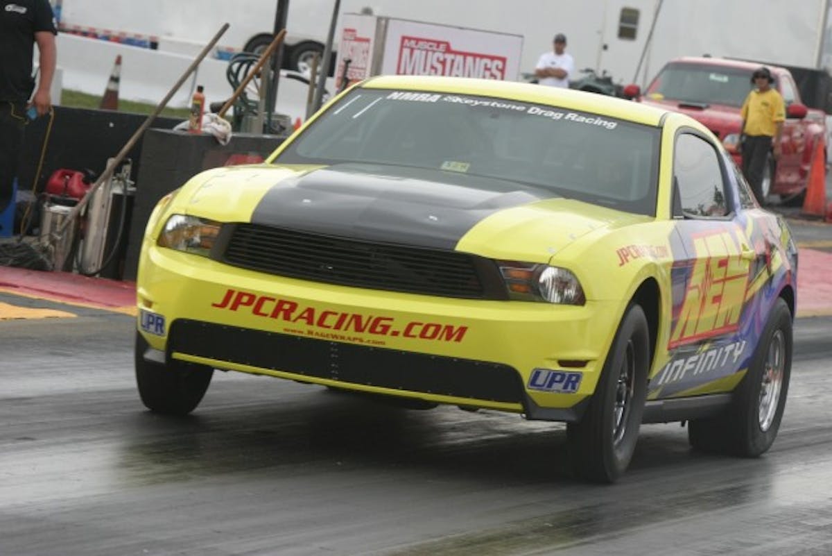In Fluid Turbo Concepts' Turbo Coyote, Justin Burcham is showing the way with an 8.44 at 158 mph. Burcham came close to the wall down track, but was able to stay in it. No doubt he's looking for a 7-second pass this weekend.