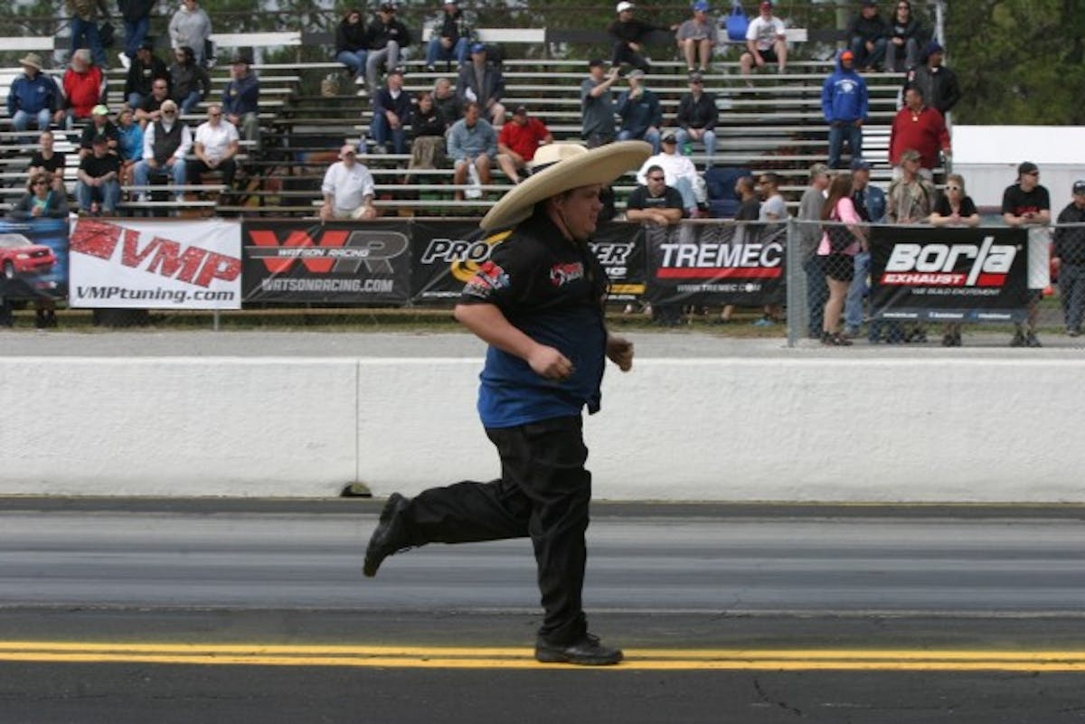 NMRA starter TJ "El Preppe" Bailey worked hard all day long to keep the track prepped and ready. We don't think his hat is good for aerodynamics, though. Perhaps a more streamlined lid will enable him to back to the line after retrieving a miscellaneous part off the track.  