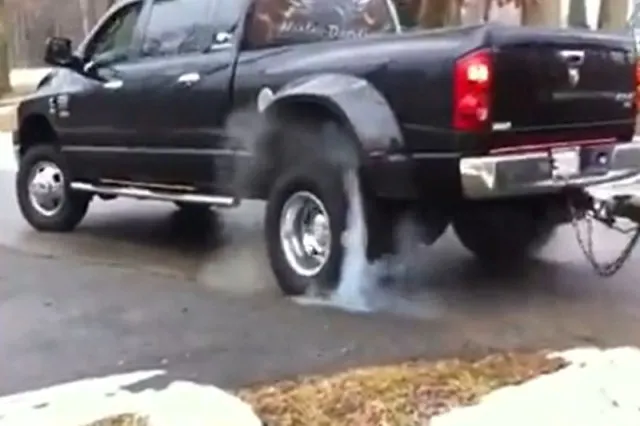 It almost looks like the smoke is being sprayed out of the wheel well from this shot.