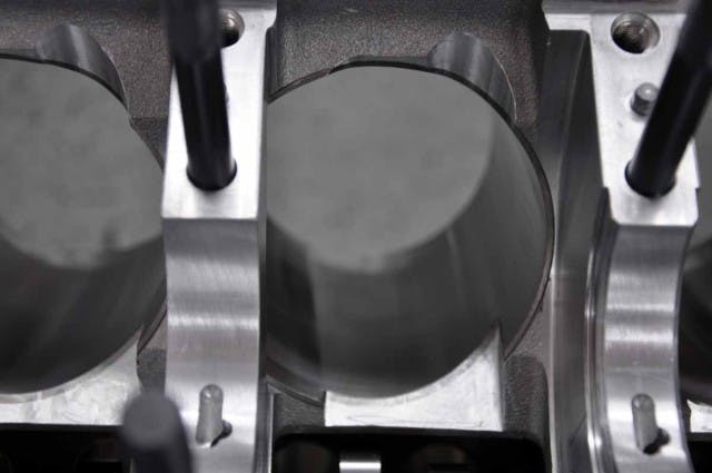 On order to use the long-arm crankshaft, the block needed reliefs machined in on both the inner and outer sides of the bore. LME's Bryan Neelen tells us that this process was performed on a Bridgeport mill, as the process if difference for every block and stroke combination it doesn't make sense to write CNC programs to perform the operations.